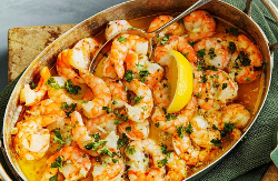 Buttergedünstete Scampi mit Zitrone und Petersilie